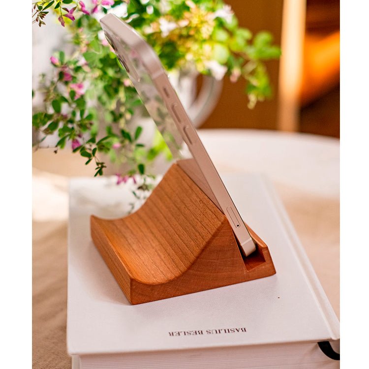 Solid wood desktop cellphone stand RusticReach with natural finish and curved cradle on Tampa Home & Garden Store