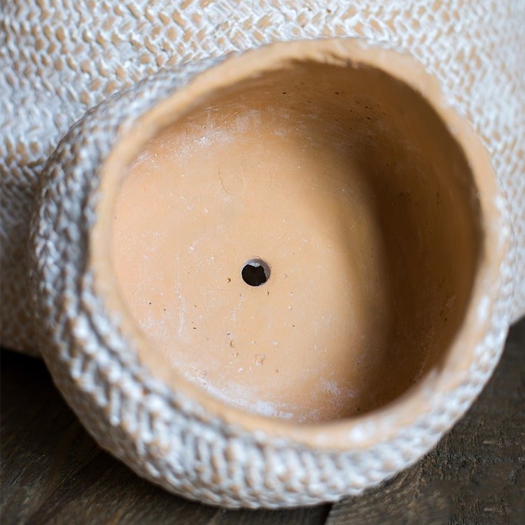 Cement weaving-pattern planter by RusticReach, round tan container with drainage hole on Tampa Home & Garden Store
