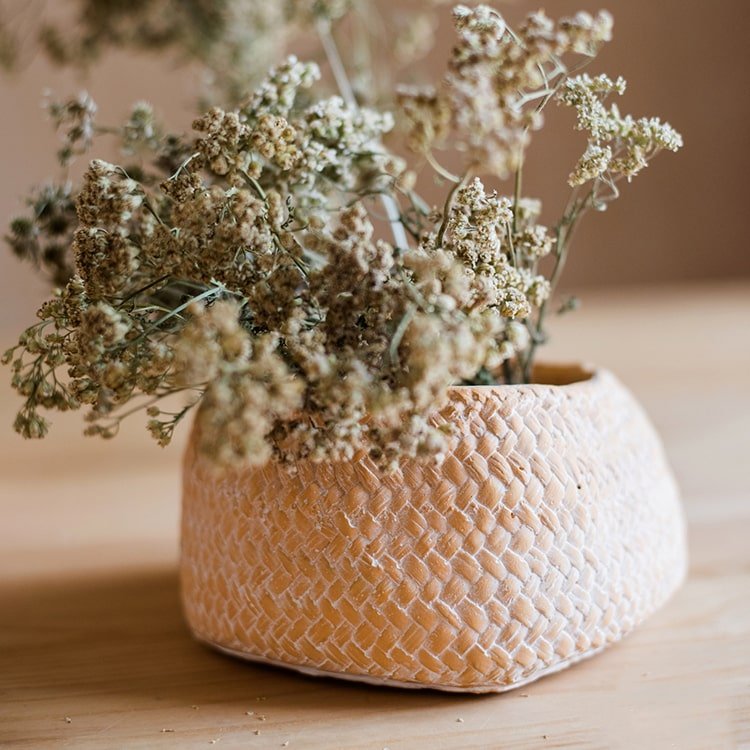 RusticReach cement weaving pattern planter with dried flowers in a beige woven pot on Tampa Home & Garden Store