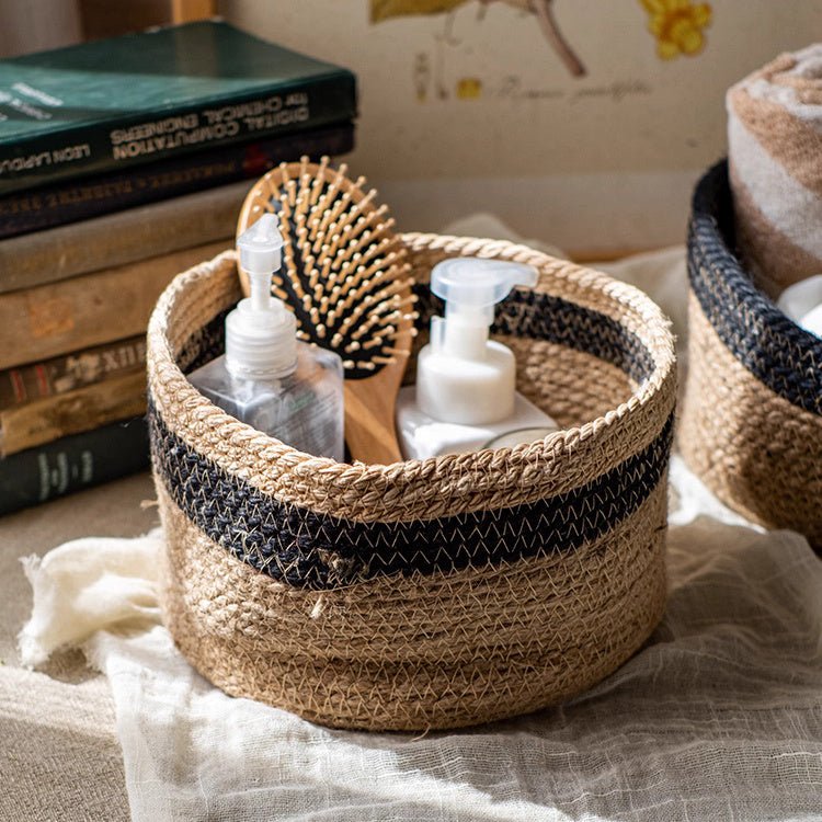 Cotton Blend Woven Storage Basket with navy stripe holding two bottles and a brush on Tampa Home & Garden Store