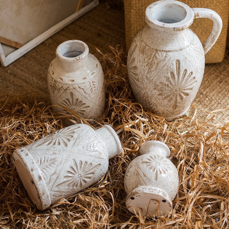 Carved floral vases set of four in white ceramic by RusticReach on Tampa Home & Garden Store