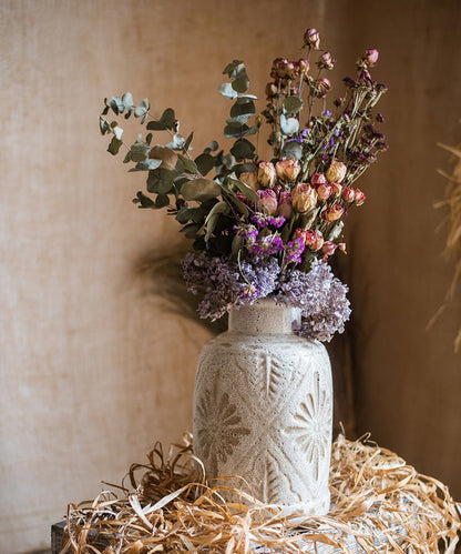 Carved Floral Vase in White ceramic with embossed botanical pattern holding dried bouquet on Tampa Home & Garden Store