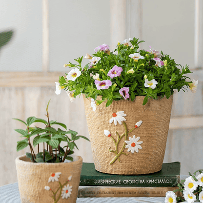 Daisy garden cement planters by RusticReach; set of 2 natural jute-wrapped pots with daisies on Tampa Home & Garden Store