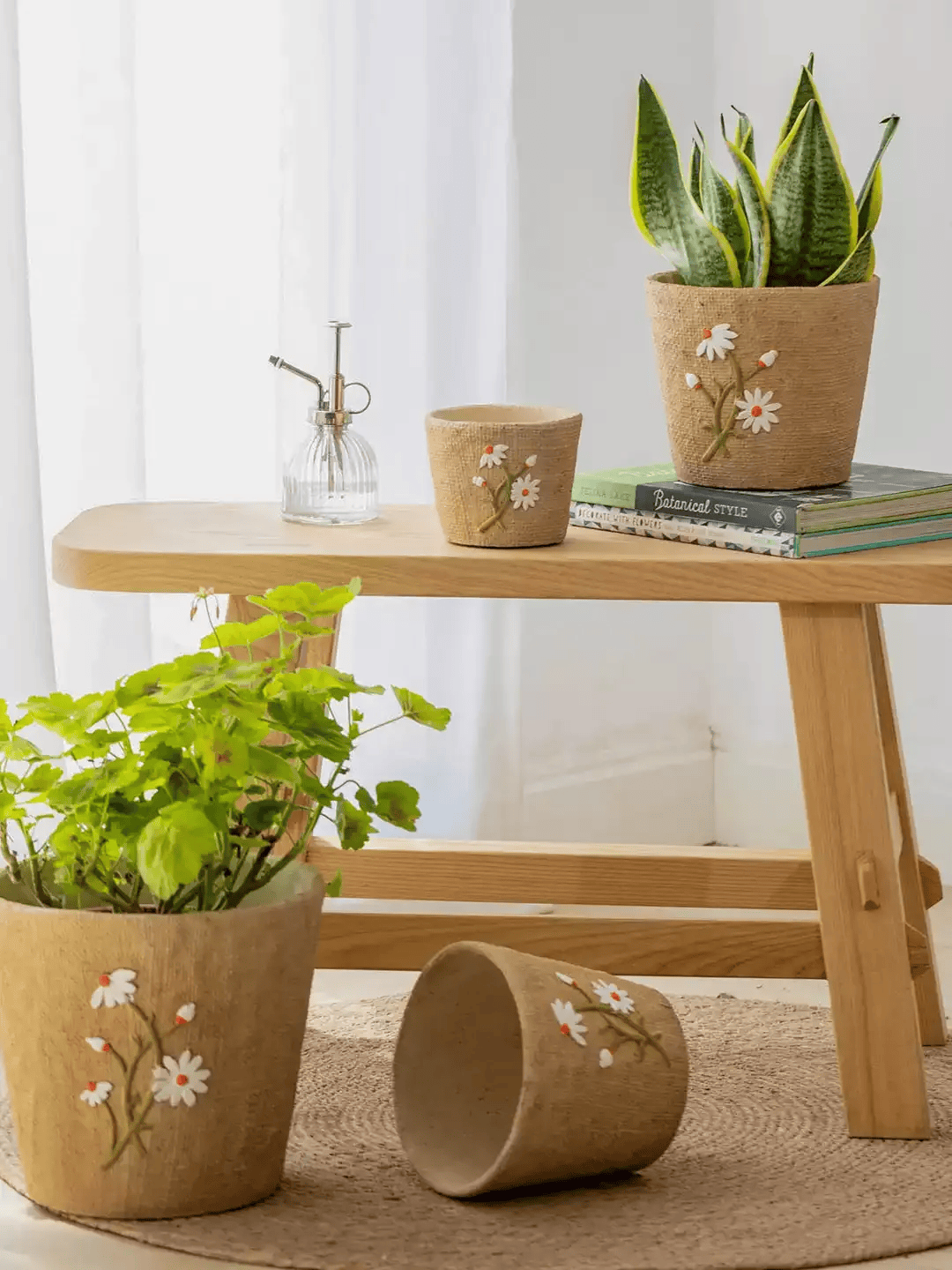 RusticReach Daisy Garden Cement Planter set of 3 with burlap texture and painted daisies on Tampa Home & Garden Store