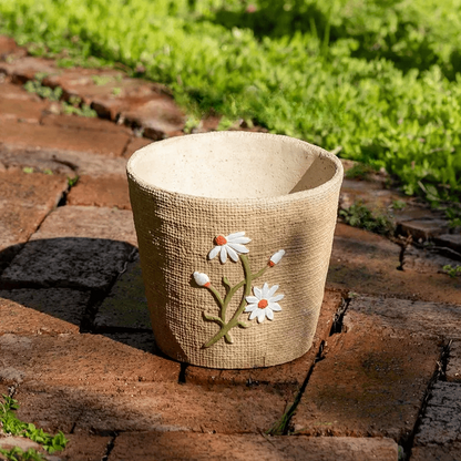 Daisy Garden Cement Planter by RusticReach, textured beige cement with white daisy relief on Tampa Home & Garden Store