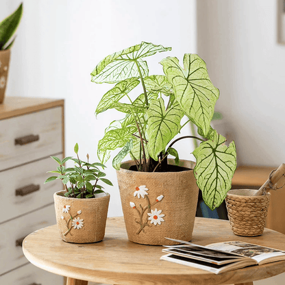 Daisy Garden Cement Planter in burlap-textured pots with white daisy motifs RusticReach on Tampa Home & Garden Store