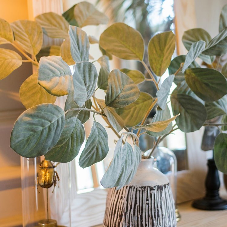Artificial Faux Large Dans Leaf Stem Plant with blue-green leaves in a striped ceramic vase on Tampa Home & Garden Store