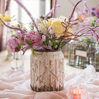 Distressed white ceramic flower jar vase by RusticReach with pink and yellow blooms on Tampa Home & Garden Store