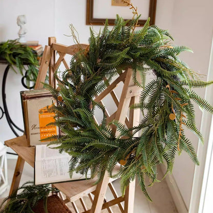 Evergreen fern garland and wreath by RusticReach, lush green faux ferns on a wooden ladder on Tampa Home & Garden Store