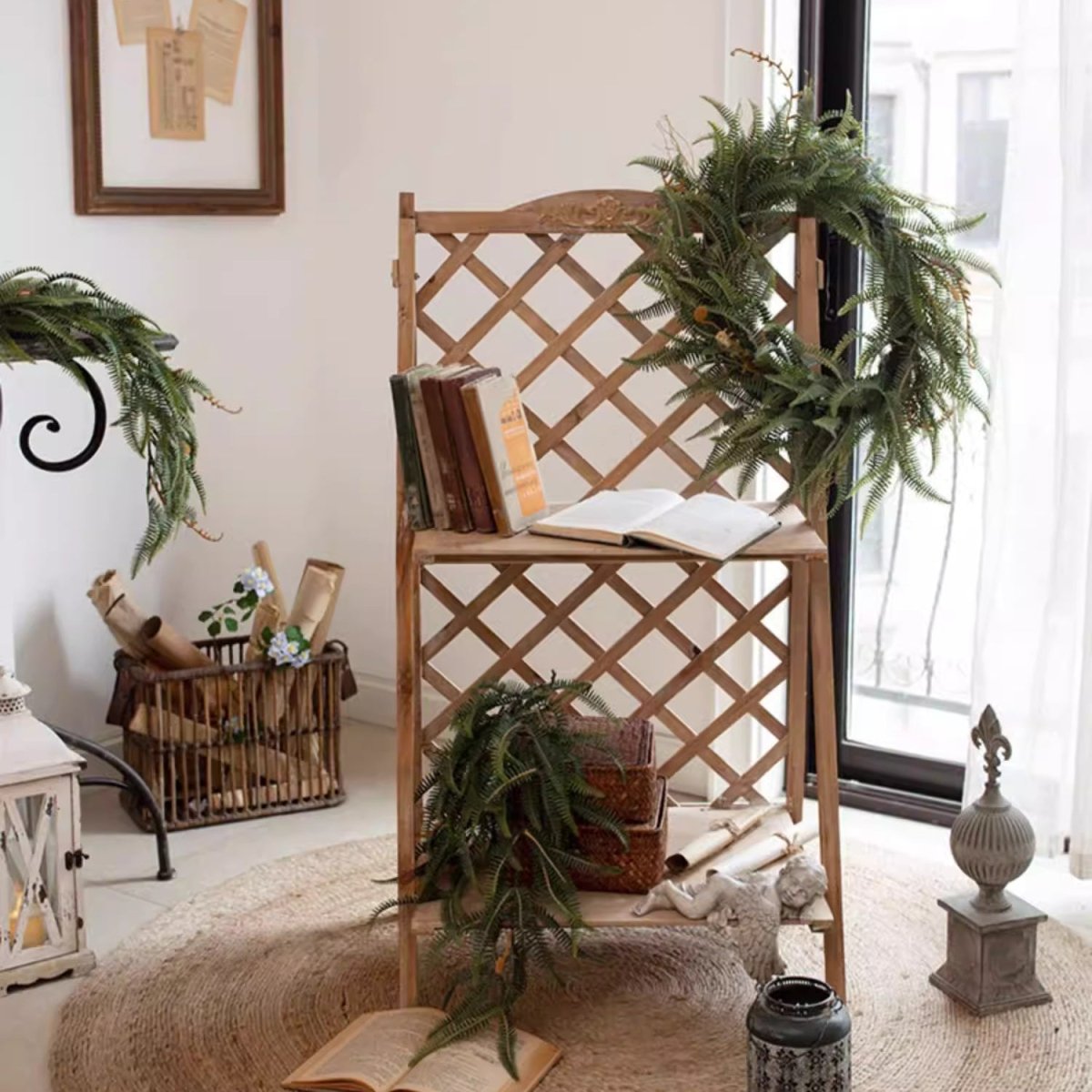 Evergreen Fern Garland and Wreath by RusticReach, lush greenery drapes a lattice chair on Tampa Home & Garden Store