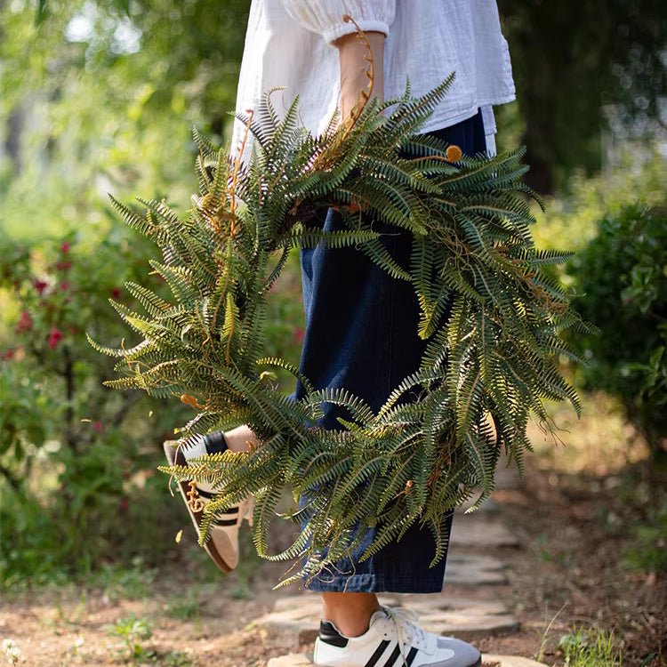 Evergreen Fern Garland and Wreath by RusticReach, lush green ferns held outdoors on Tampa Home & Garden Store