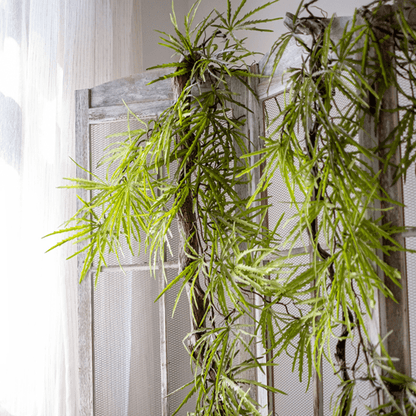 Artificial Ferns Vine Stem 39-inch long with bright green slender leaves over RusticReach screen on Tampa Home & Garden Store