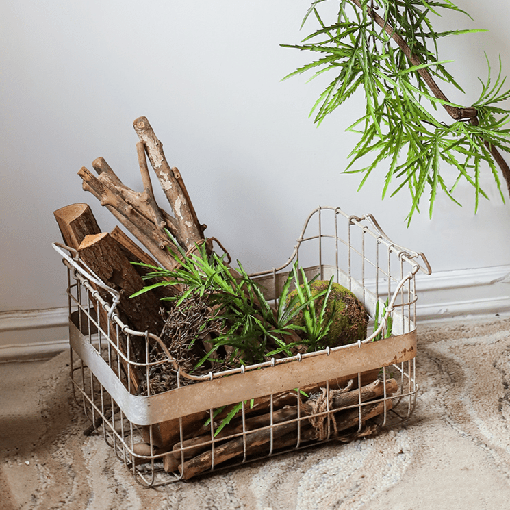 Artificial ferns vine stem 39 in long green in a metal wire basket with wood logs RusticReach on Tampa Home & Garden Store