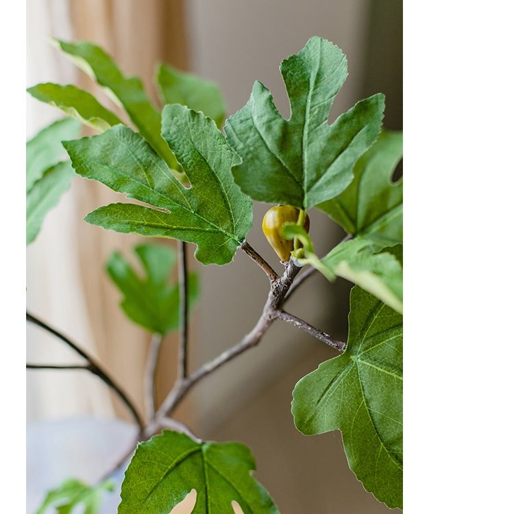 Artificial Faux Fig Leaf Stem by RusticReach with green lobed leaves on a brown stem on Tampa Home & Garden Store