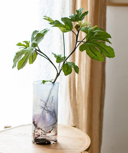 Artificial Faux Fig Leaf Stem by RusticReach in a clear glass vase with green fig leaves on Tampa Home & Garden Store