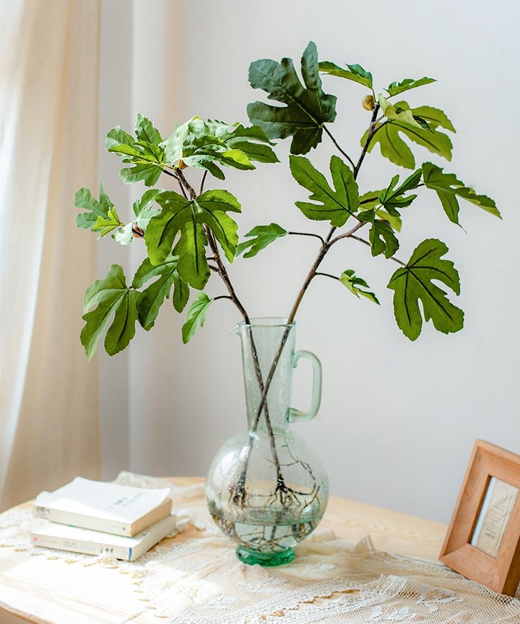 Artificial Faux Fig Leaf Stem by RusticReach with green leaves in a clear glass vase on Tampa Home & Garden Store