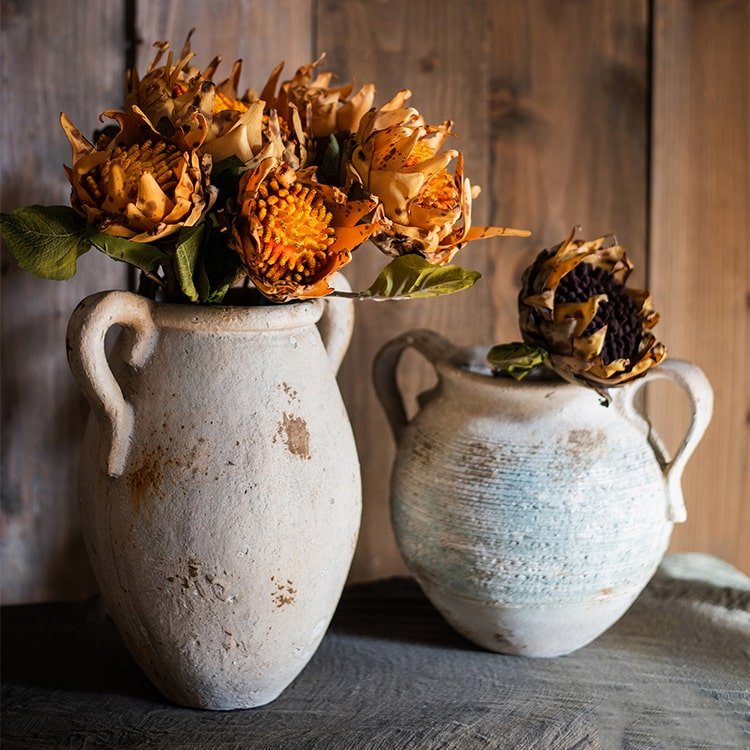 Artificial Flannel Sunflower Stem with orange blooms in two rustic ceramic jugs on Tampa Home & Garden Store