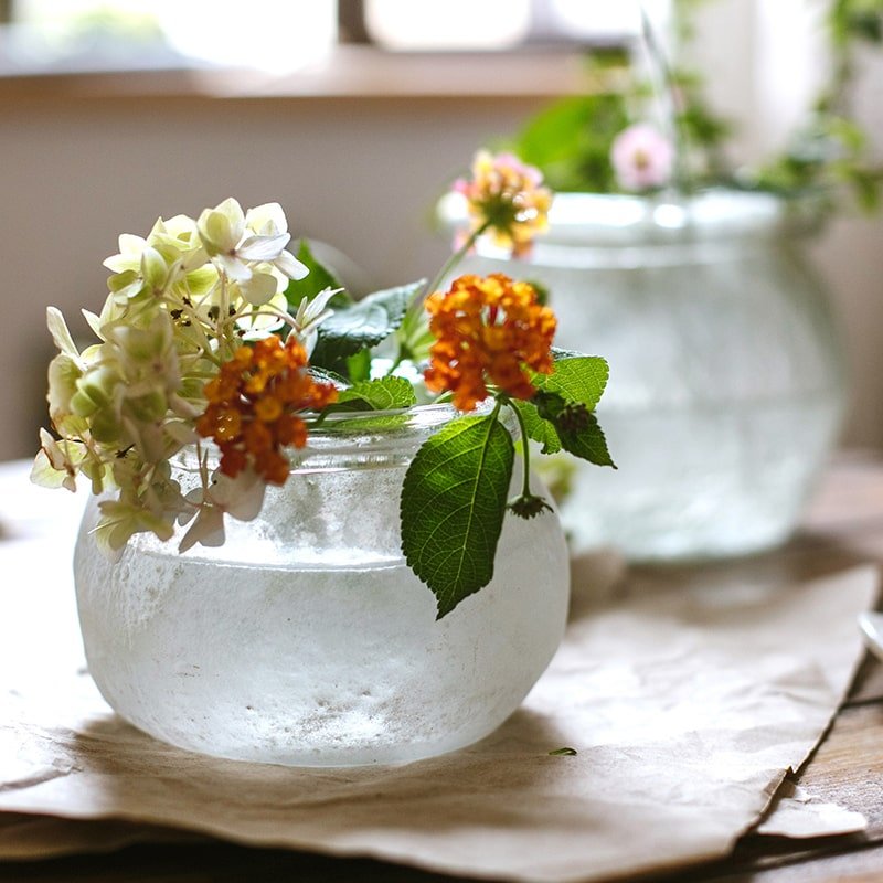 Hand blown glass foggy vase by RusticReach; rounded frosted glass with hydrangea blooms on Tampa Home & Garden Store
