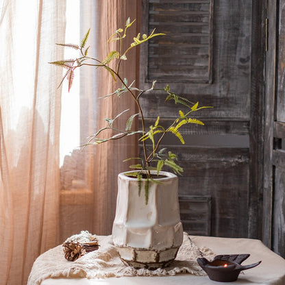 RusticReach artificial forked fern stem in a chunky textured ceramic vase on a rustic table on Tampa Home & Garden Store