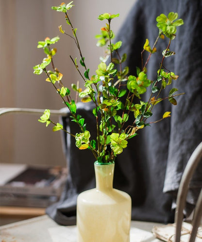 Faux Gaura flower stem, silk, 20in, RusticReach, green leaves in beige vase on Tampa Home & Garden Store