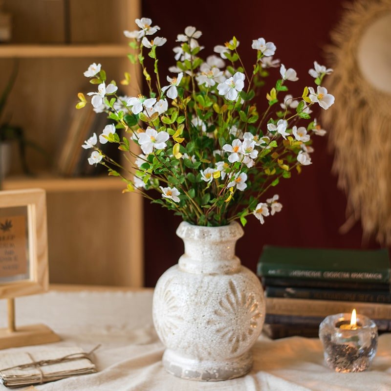 RusticReach Faux Silk Gaura Stem 20in tall in a textured white vase with blossoms on a table on Tampa Home & Garden Store