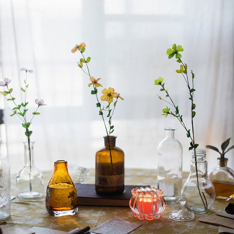 Faux Silk Gaura Stem 20" tall, RusticReach amber bottle centerpiece with clear bottles on Tampa Home & Garden Store