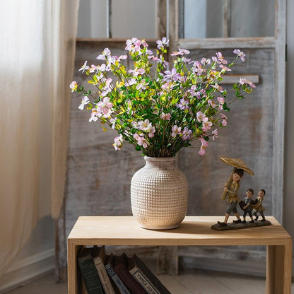 Silk Faux Gaura Flower Stem pink/purple, 20-inch tall, RusticReach in a textured beige vase on Tampa Home & Garden Store