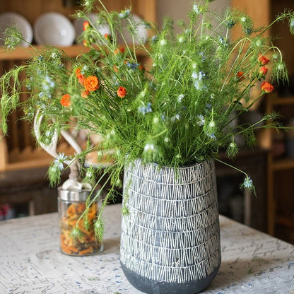 Geometry Line ceramic stoneware flower pot with white geometric pattern, filled with wildflowers on Tampa Home & Garden Store