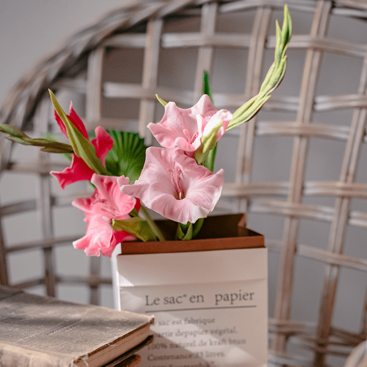 Faux Silk Gladiolus Flower Stem by RusticReach with pink blooms in a white planter on Tampa Home & Garden Store