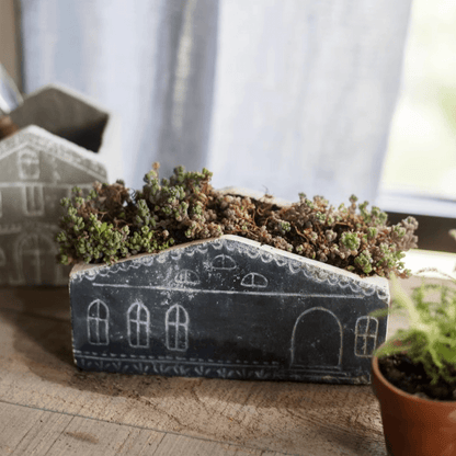 2 RusticReach TinyHome clay planters, dark slate house-shaped pots, white outlines, succulents on Tampa Home & Garden Store