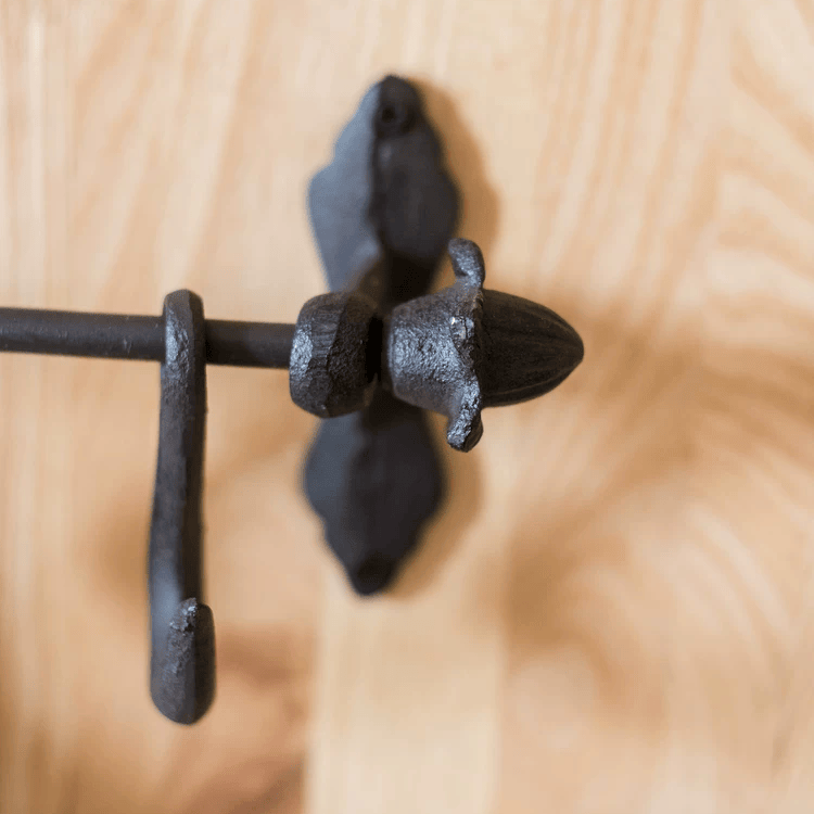 Farmhouse Iron Hook Rail by RusticReach with black wrought-iron hooks on wood on Tampa Home & Garden Store