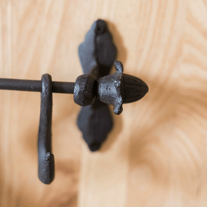 Farmhouse Iron Hook Rail by RusticReach with black wrought-iron hooks on wood on Tampa Home & Garden Store