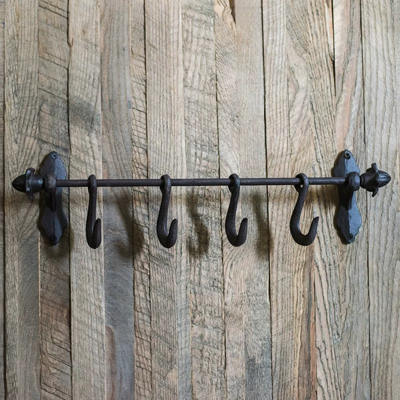 Farmhouse iron hook rail with five black S-hooks, wall-mounted rustic finish on Tampa Home & Garden Store