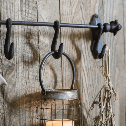 Farmhouse Iron Hook Rail RusticReach dark metal with multiple hooks on a rustic wood backdrop on Tampa Home & Garden Store