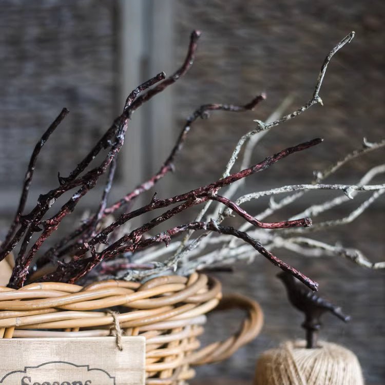 Ikebana Twig Branch by RusticReach in wicker basket with artificial purple-gray twigs on Tampa Home & Garden Store