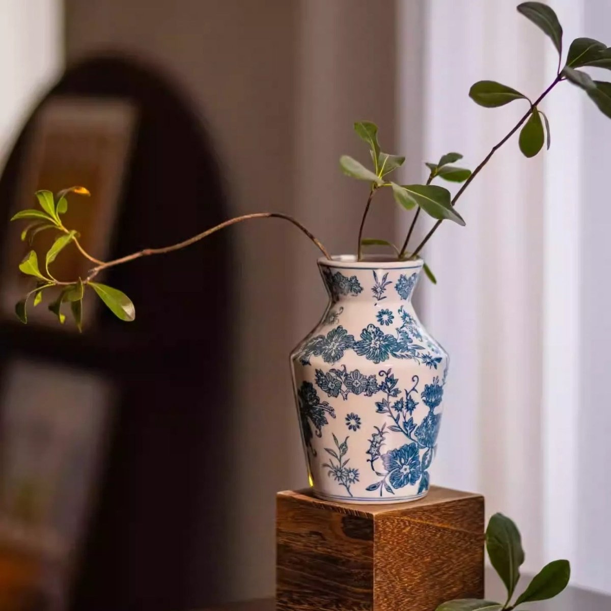 Indigo porcelain vase with blue floral pattern by RusticReach, ceramic vase on wood pedestal on Tampa Home & Garden Store