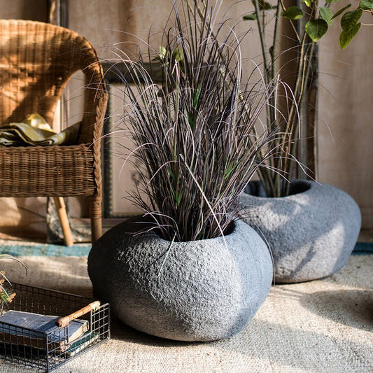 Japanese Zen Style Gray Stone Flowerpots by RusticReach, pair of pots with tall grasses on Tampa Home & Garden Store