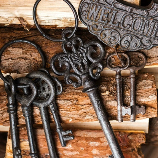 Farmhouse Vintage Key Wall Accent by RusticReach; ornate cast iron keys with a WELCOME sign on Tampa Home & Garden Store