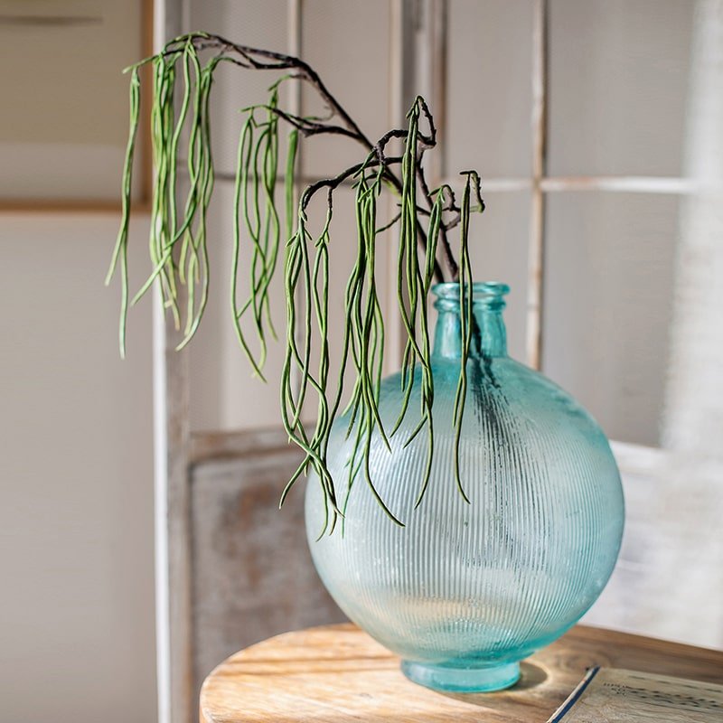 Let Fall plant stem 29" tall by RusticReach with green hanging strands in ribbed blue glass vase on Tampa Home & Garden Store