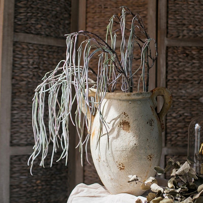 Artificial Faux Let Fall Plant Stem 29in tall with gray-green stems in a rustic ceramic pitcher on Tampa Home & Garden Store