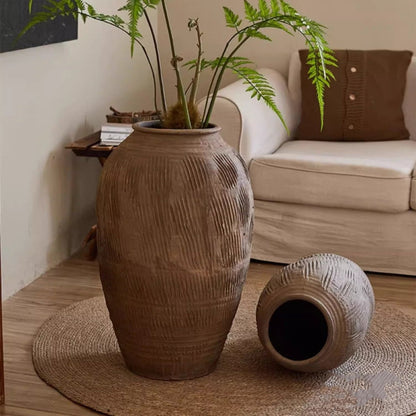 Large RusticReach floor-standing clay pot with brown textured glaze and fern, plus a second pot on Tampa Home & Garden Store