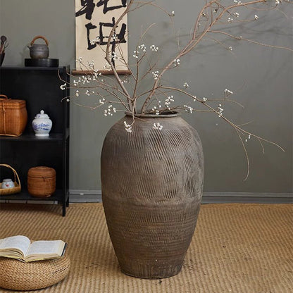 Large floor-standing clay pot by RusticReach, gray ceramic vase with white blossoms on Tampa Home & Garden Store