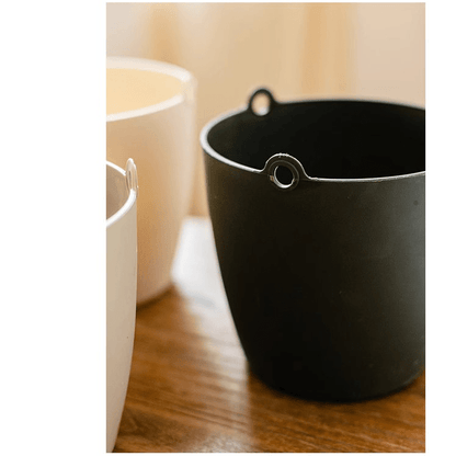 Modern resin hanging planter for artificial plants in black with metal eyelet hangers on Tampa Home & Garden Store