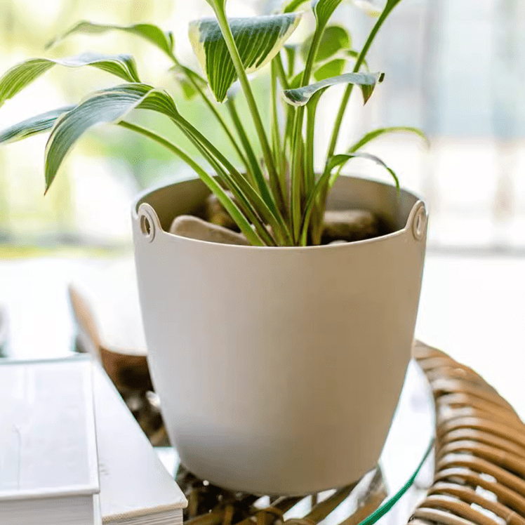 Modern resin hanging planter for artificial plants, light gray with round side holes on Tampa Home & Garden Store