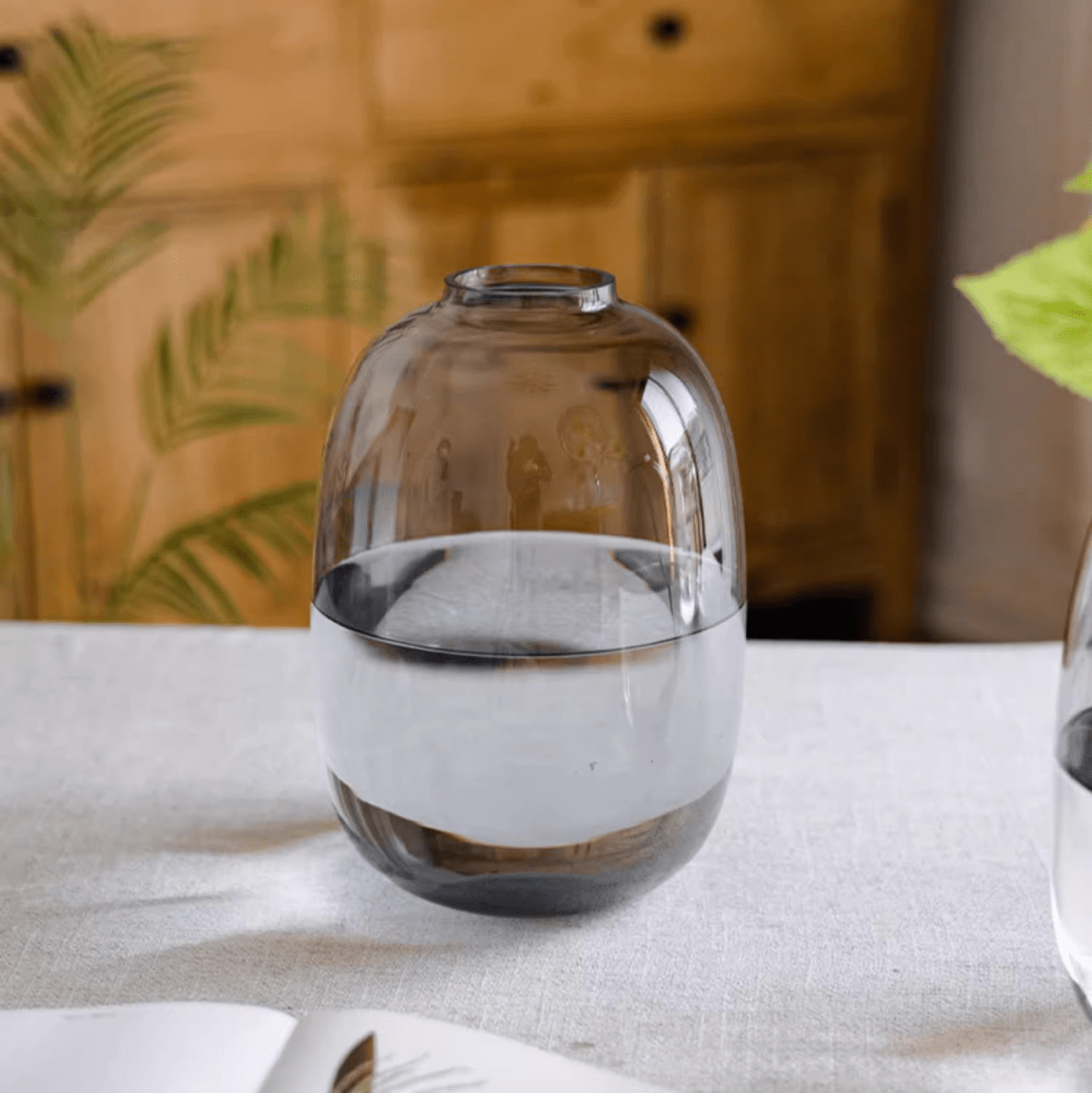 Modern Clear Glass Vase with rounded silhouette and smoky gray base on Tampa Home & Garden Store