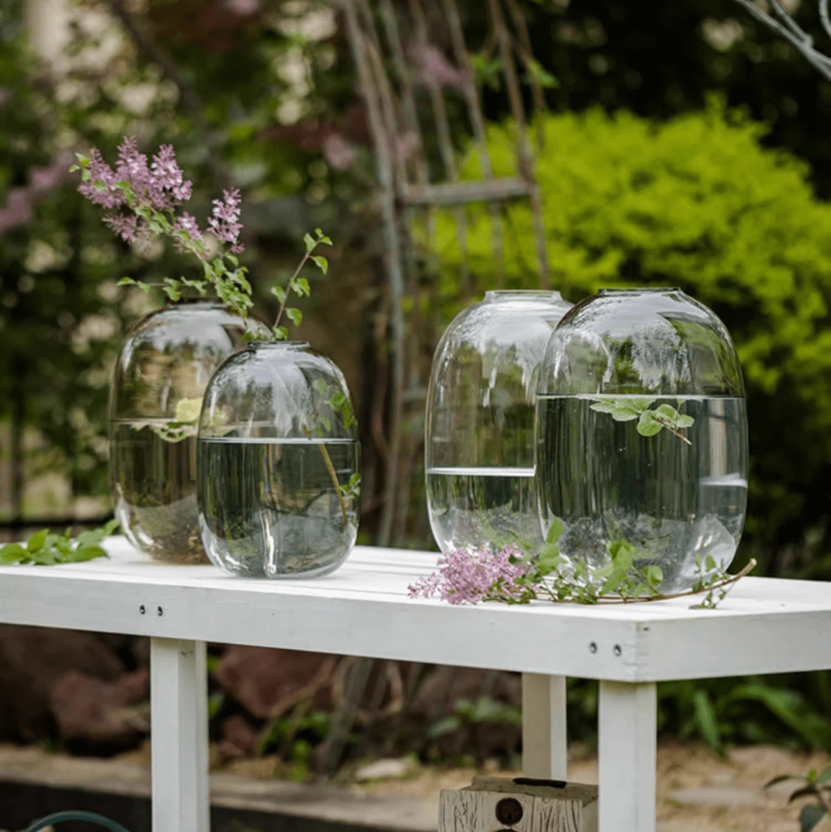 Modern Clear Glass Vase set of 3 by RusticReach with lilac stems on a white table on Tampa Home & Garden Store
