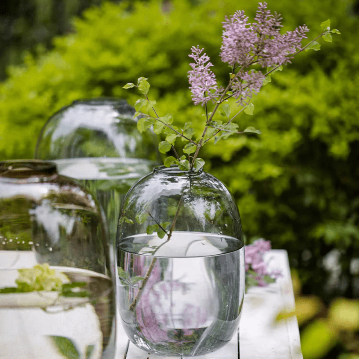 RusticReach Modern Clear Glass Vase trio with lilac sprig and greenery on Tampa Home & Garden Store