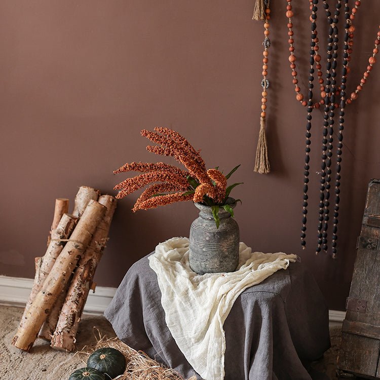 Artificial Millet Bundle 19in Tall in galvanized jug with orange millet plumes on gray table on Tampa Home & Garden Store