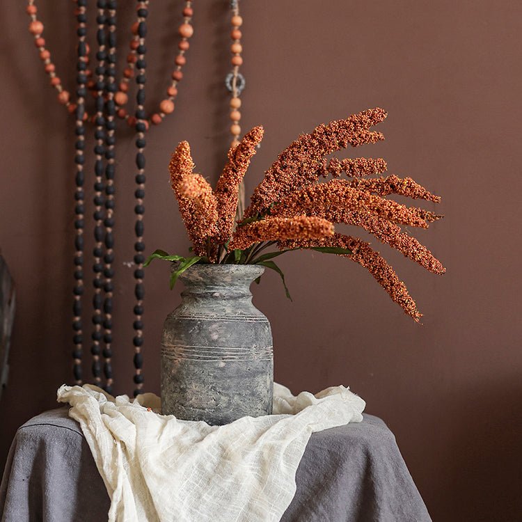 RusticReach artificial millet bundle 19 tall in orange tones in gray metal vase on Tampa Home & Garden Store