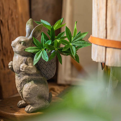 Mini Faux Potted Green Plant in a stone bunny planter with lush green leaves on Tampa Home & Garden Store